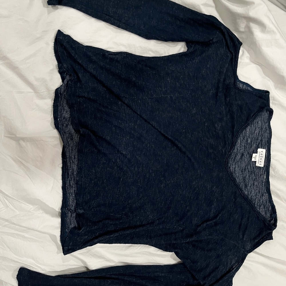 Gently used. Long sleeve blue shirt,cold shoulder